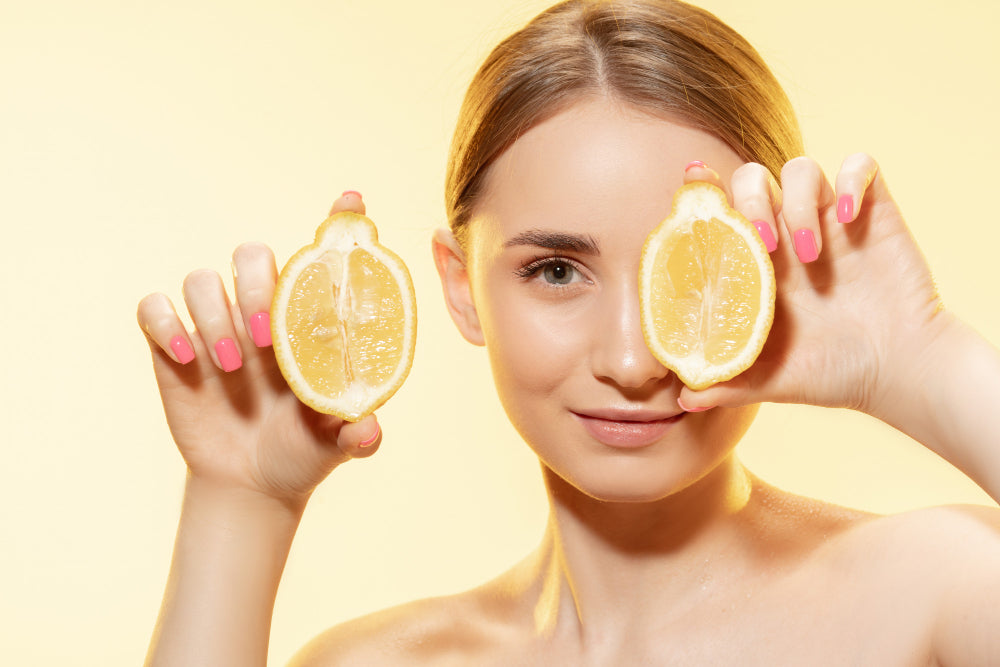 girl holding lemon