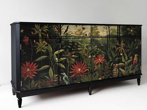 Vintage black painted sidebord decorated with H Rousseau inspired jungle design. 