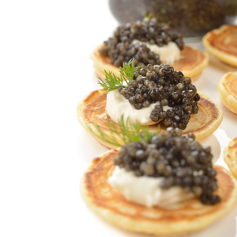 Caviar with Creme Frache on mini blinis
