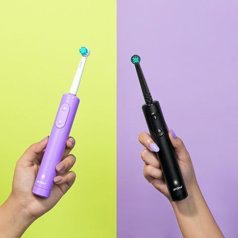 Screen divided into 2 parts, both have hands holding Perfora's Smart Oscillating toothbrush. Hand on left has lavender and hand on right has black variant grasped.