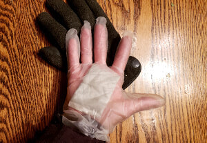 Plastic gloves to keep hands warm and dry. Barn hack