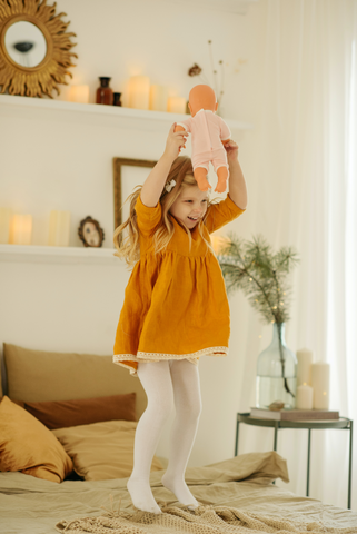 Image of girls jumping on a mattress, not recommended for prolonging the life of a mattress