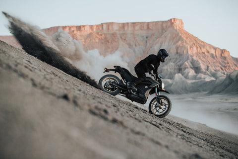 rider skidding in dirt