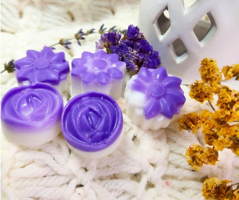 purple and white flower shaped wax melt tarts