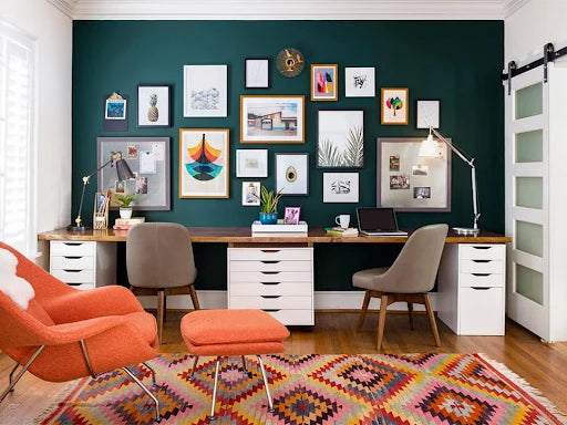 home office accent wall with an orange chair