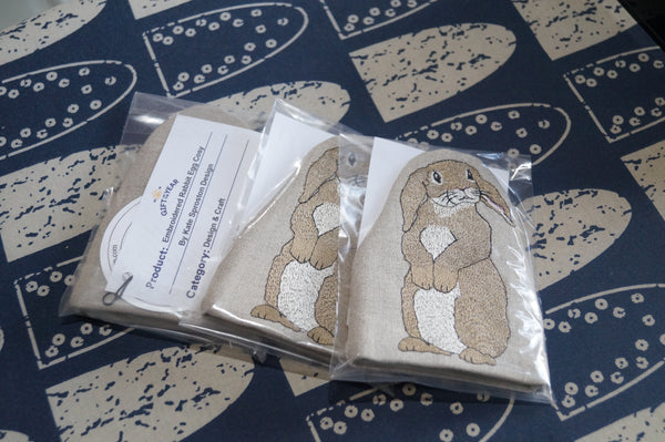 Embroidered rabbit egg cosies by Kate Sproston Design wrapped and ready to post