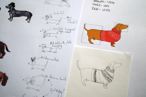 Sketchbook page with drawings of dachshunds