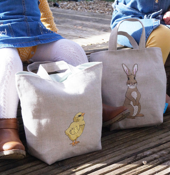 Embroidered little chick and rabbit Easter egg hunting bags by Kate Sproston Design