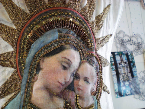 Detail of hand embroidered corset featuring an image of the Virgin with Child by Kate Sproston