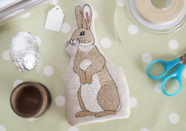 Embroidered rabbit egg cosy by Kate Sproston Design