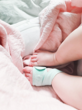 Edge o' beyond Blog Luxury Baby Products worth splurging on owlet sock image