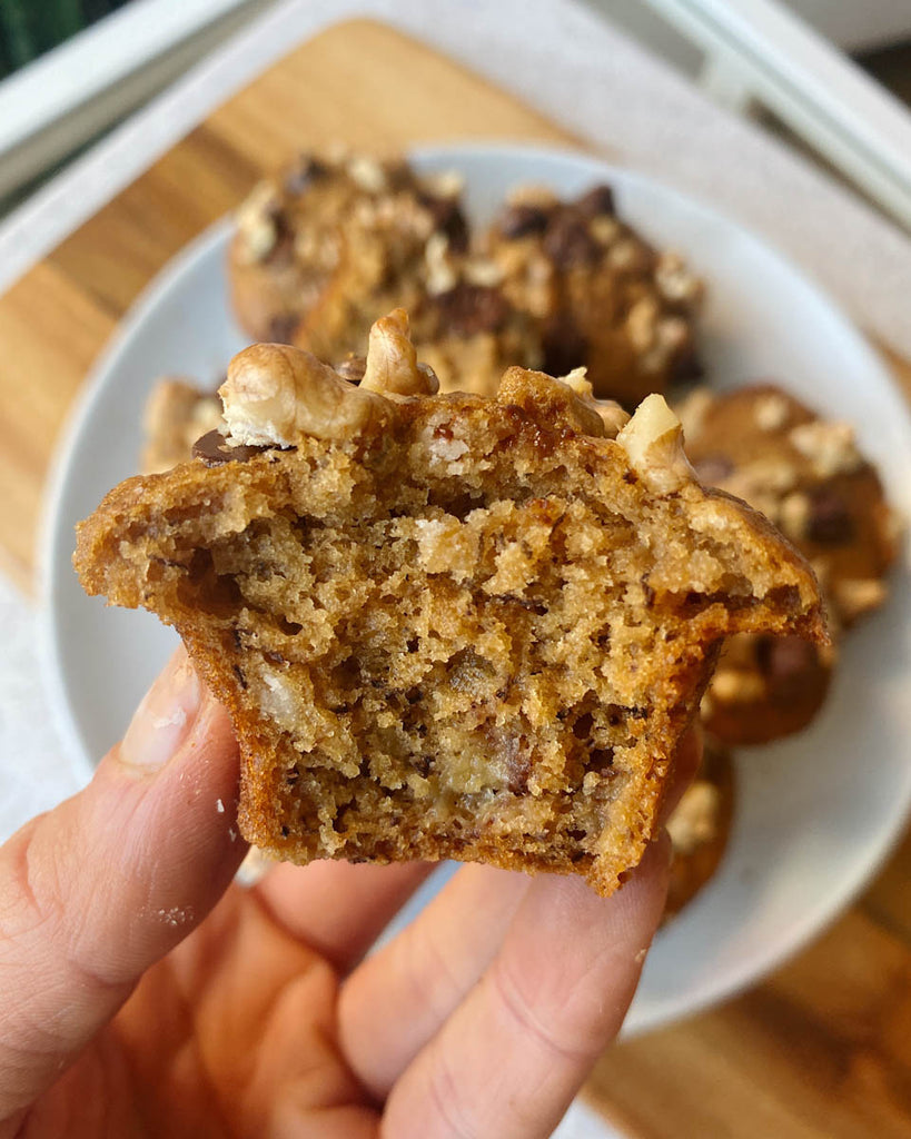 Holding Sourdough Banana Chocolate Chip Muffins