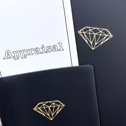 Official certified jewelry appraisal documents.