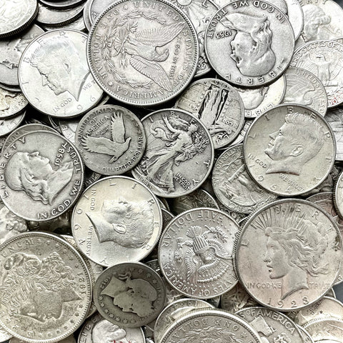 Original photo showing a mix of different silver US coins from 1964 and earlier.
