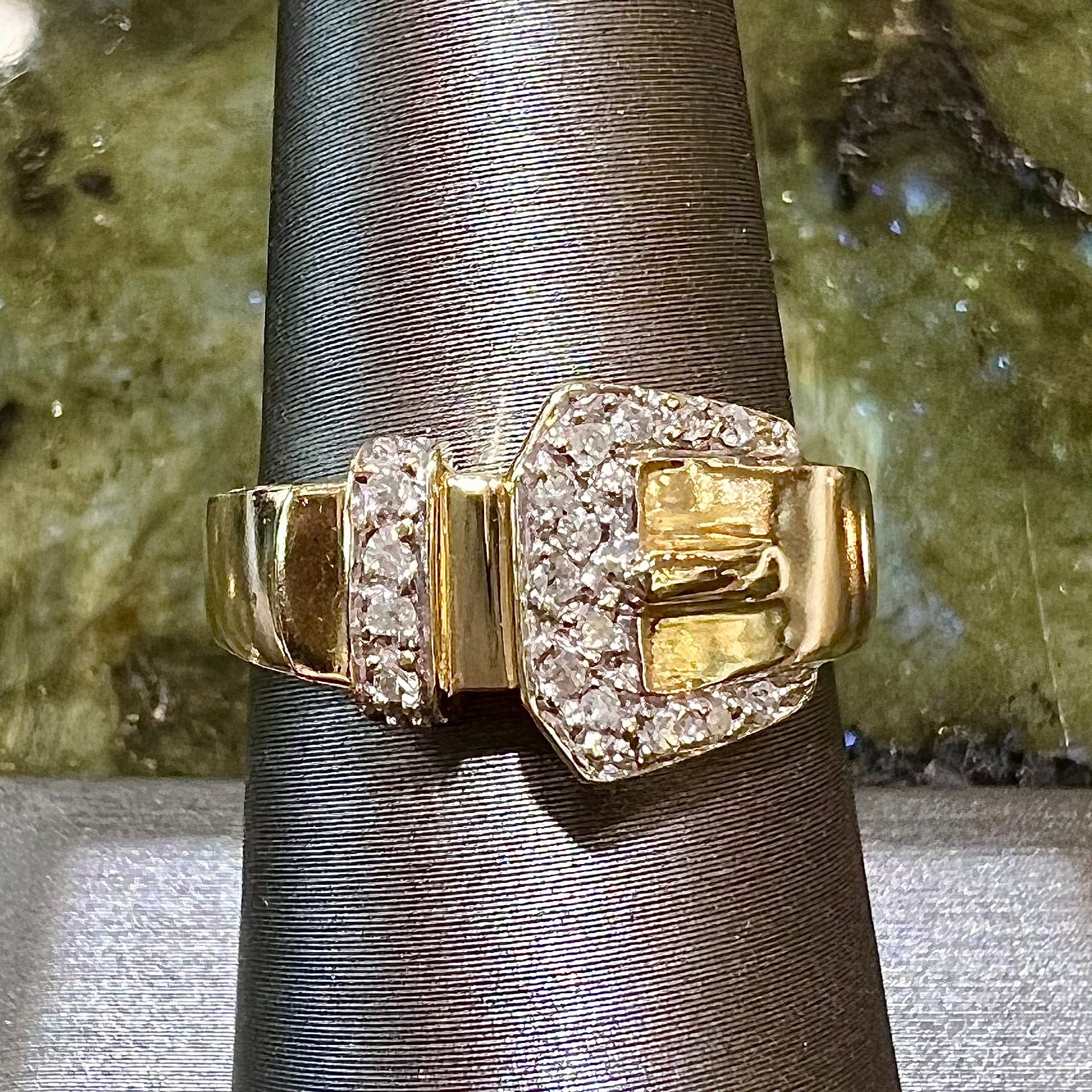 gold belt buckle ring meaning