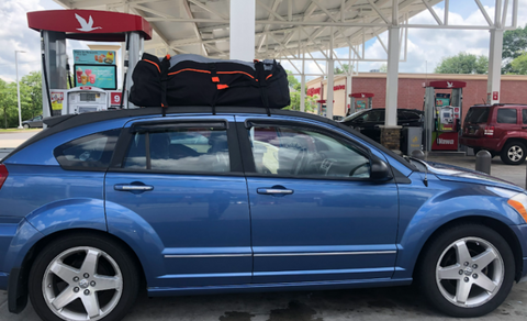The absence of a roof rack doesn't limit your ability to use a soft car top carrier, expanding options for various vehicles.
