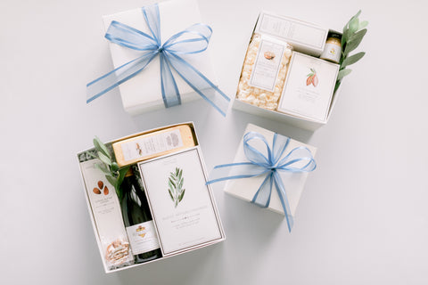 Wine gift boxes wrapped in a blue bow