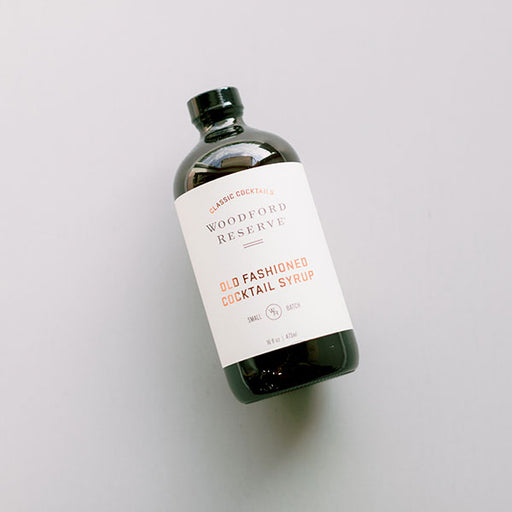 https://cdn.shopify.com/s/files/1/0587/4735/5343/products/BAB-Woodford-Cocktail-Syrup_512x512.jpg?v=1660765742