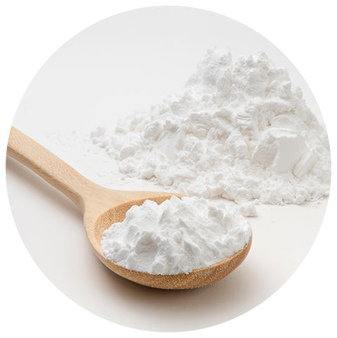 white powder on a wooden spoon
