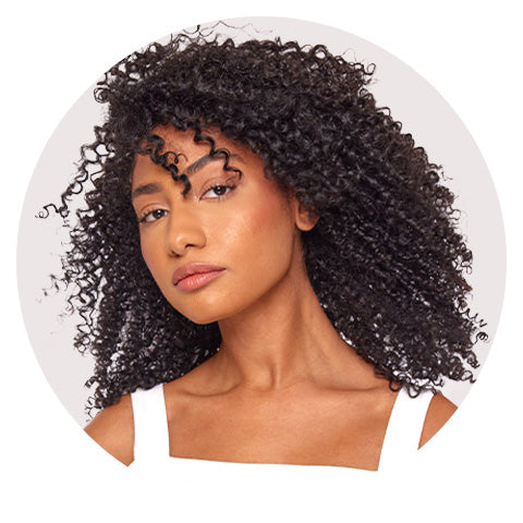 woman with tight defined juicy dark curls