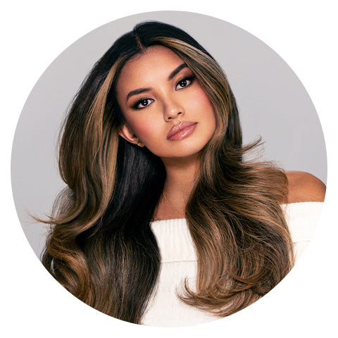 woman with shiny silky looking brown hair