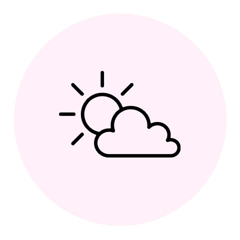 sun peeking from behind the clouds icon