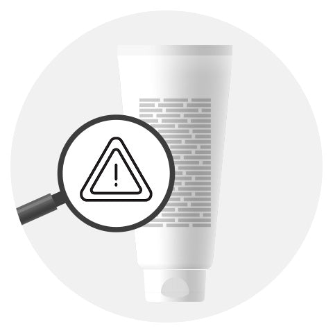 product bottle with toxic symbol and magnifying glass