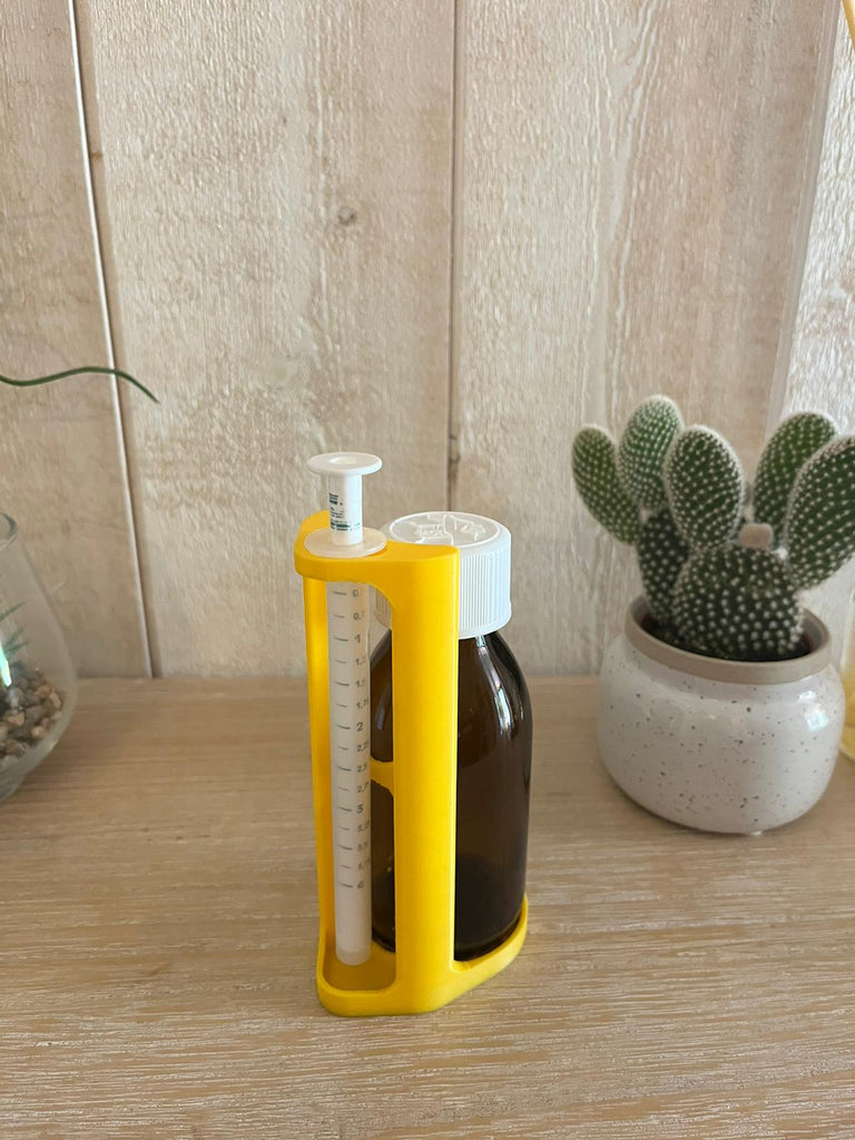 The new design of suppa two combined the pipette holder with a space for the medication bottle.