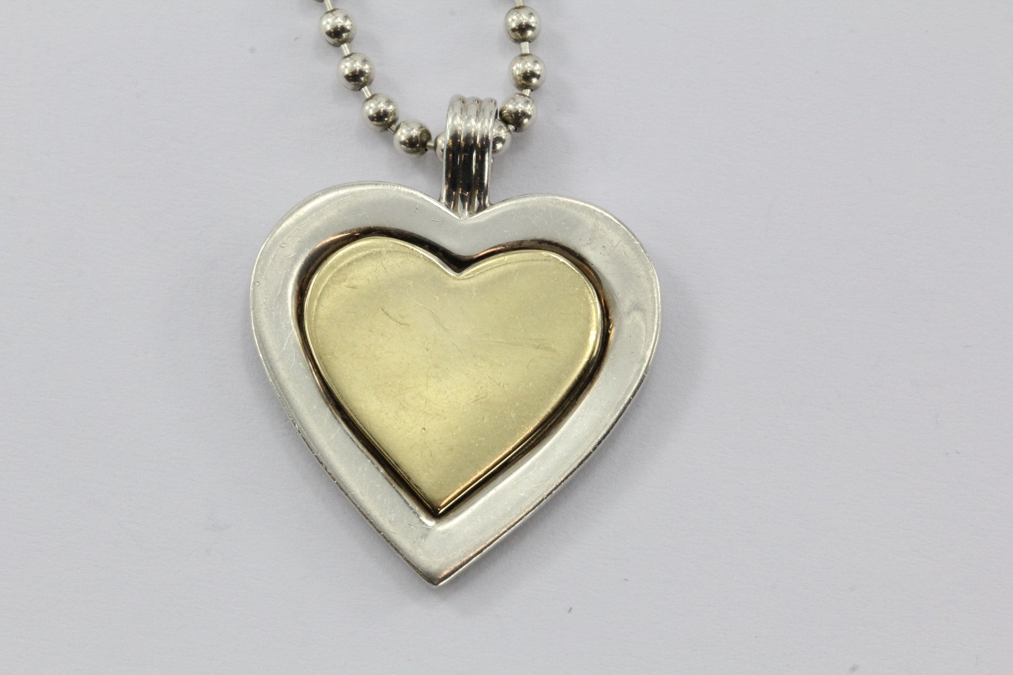 Vintage Tiffany & Co Sterling Silver & 18K Gold Heart Pendant