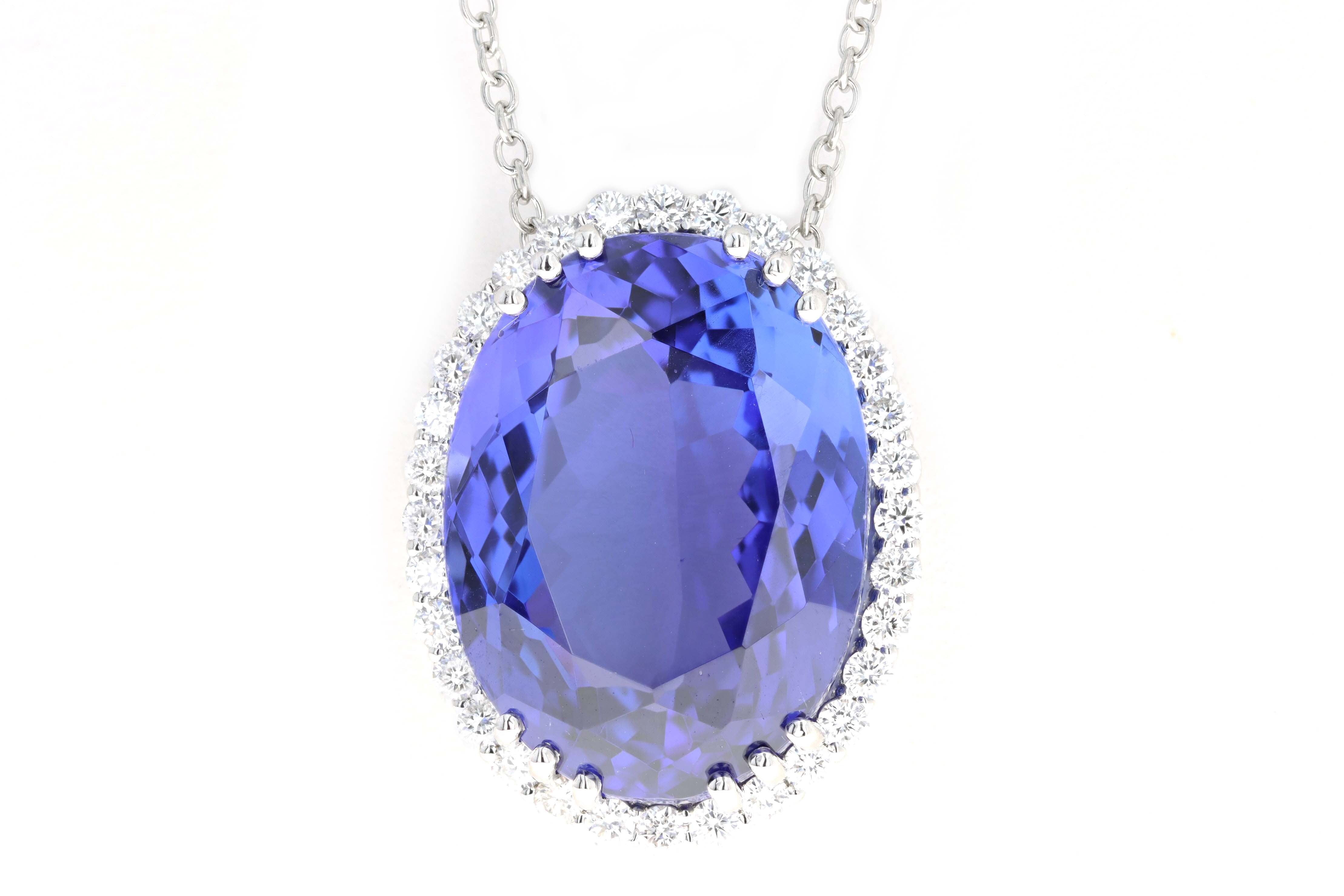 Platinum 28.65 Carat Oval Tanzanite & Diamond Halo Pendant Necklace