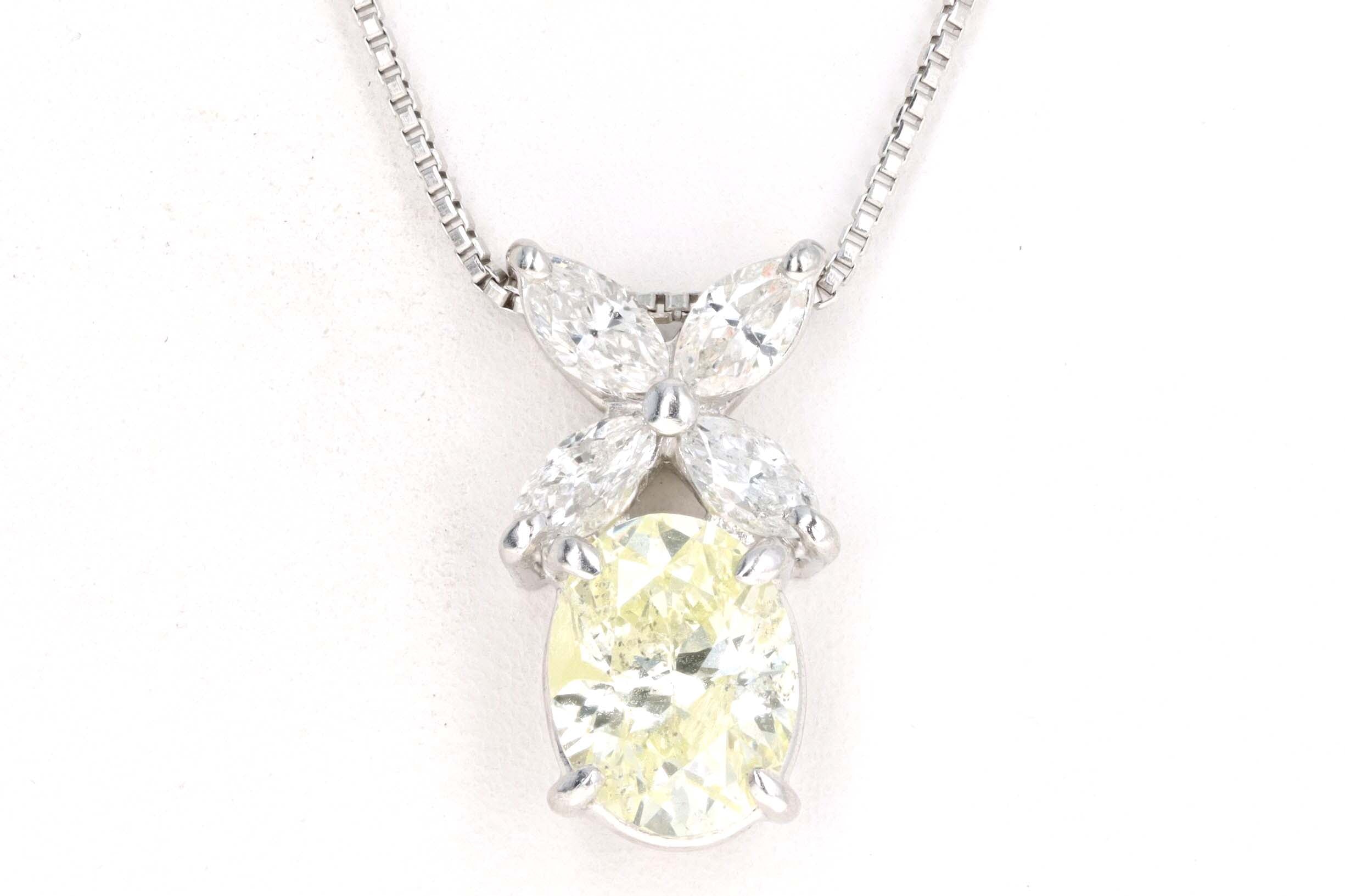 Platinum 1.33 Carat Oval Cut Light Yellow Diamond Pendant Necklace