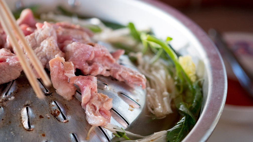 Moo Kra Ta: Thai BBQ Delights on the Sizzle