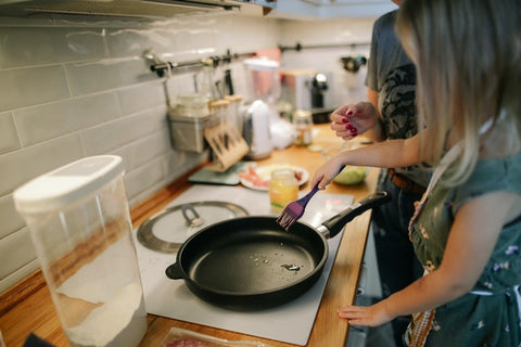 Child helping with cooking