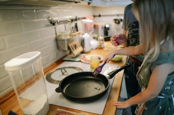 young dyspraxic girl cooking