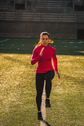 Woman performs long stride sprints as she trains for her first half marathon