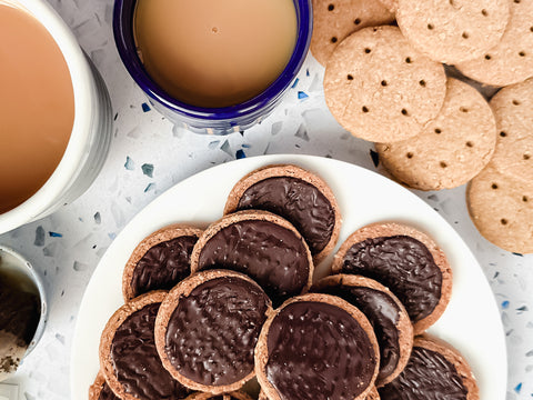 Chocolate coated Biscuits paired with a cut of tea