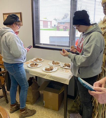 Janies Mill team taste tests bread made from grain variety trials on Janies Farm