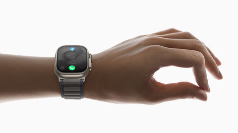 Apple Watch Ultra being worn on a wrist, using the double tap feature