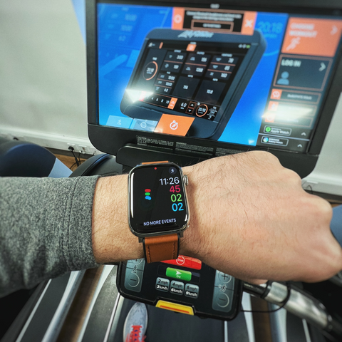 Apple Watch being used during a workout, displaying workout information