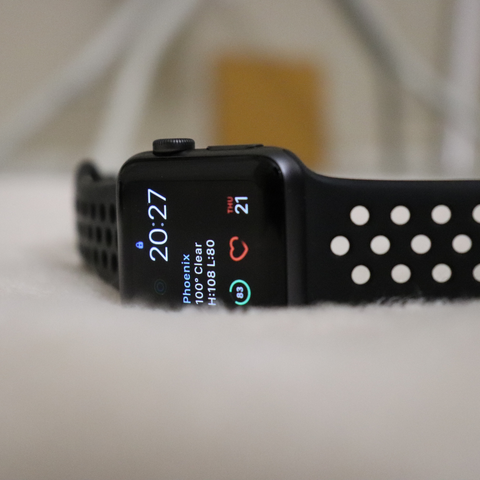 Apple Watch displaying the time and health data