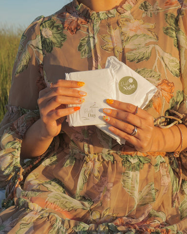 Woman holding Ruth Pads