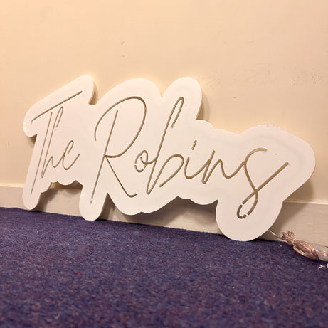 The robins backlit sign with white board 