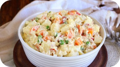 potato salad with mayonnaise and carrots in a bowl 