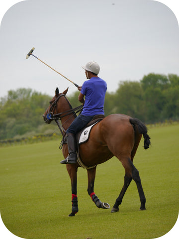 man riding a horse