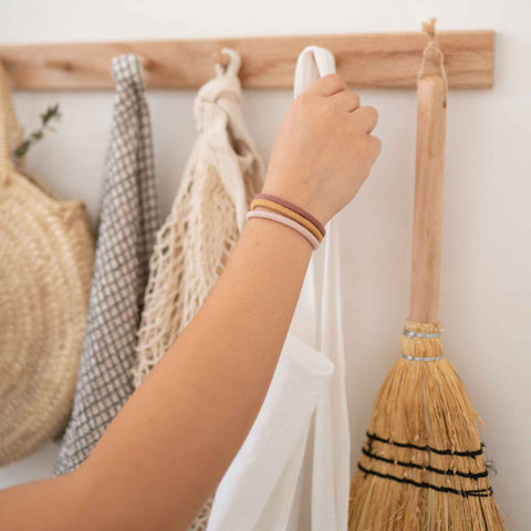 KOOSHOO plastic-free hair ties in Golden Fibres on wrist 