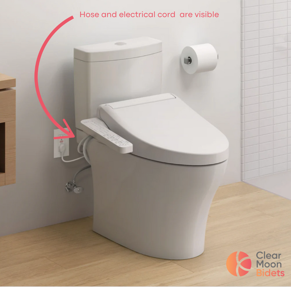 TOTO AQUIA IV toilet with C2 WASHLET® cords are visible