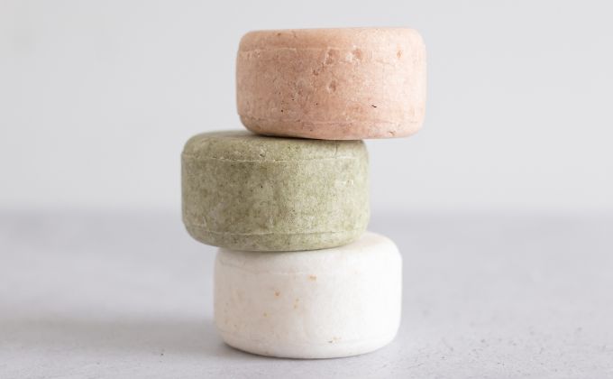 shampoo bars stacked against a white background