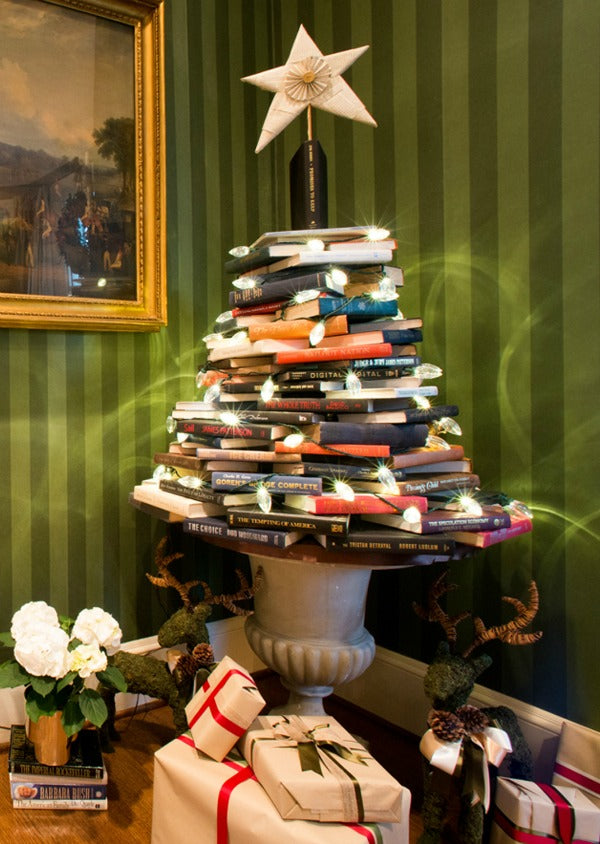 small christmas trees with books