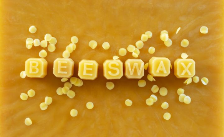 beeswax with the word beeswax spelled on it