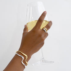 Layered gold and silver bangle cuff